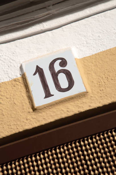 istock Number Sixteen on Building Facade 1478388131