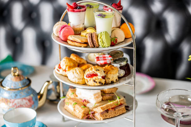 istock Served white table with a set of various desserts in the restaurant 1478394005