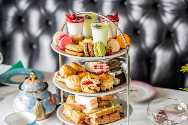 istock Served white table with a set of various desserts in the restaurant 1478394080