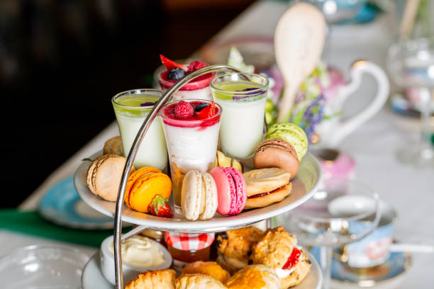 istock Served white table with a set of various desserts in the restaurant 1478394089