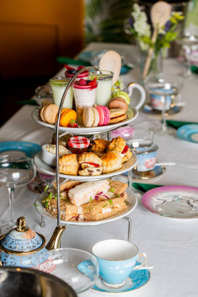 istock Served white table with a set of various desserts in the restaurant 1478394091