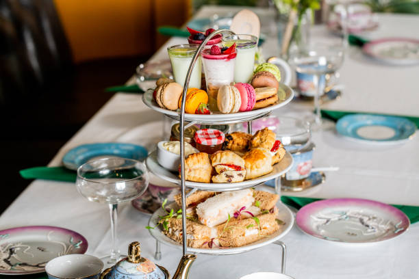 istock Served white table with a set of various desserts in the restaurant 1478394113
