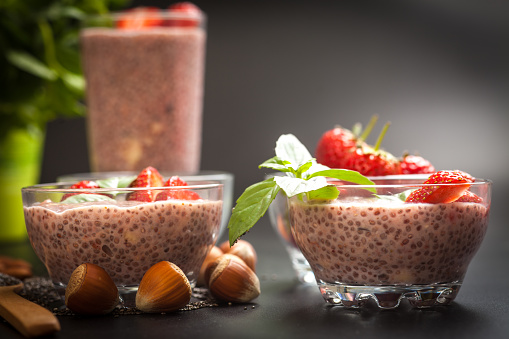 Chia Pudding in almond milk with Strawberry and mint in Transparent Glasses