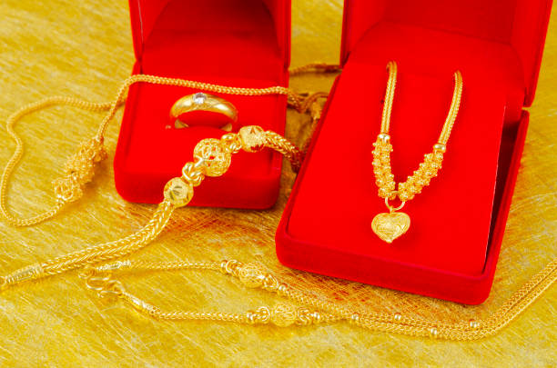istock The Gold Bracelet in red velvet box container. 1478397682