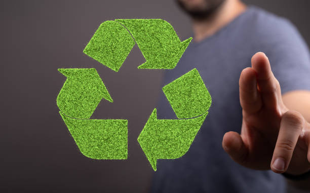 istock Person presenting a virtual projection of recycling symbol 1478397861