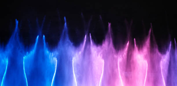 istock Abstract colorful fountain splashes in dark 1478398846