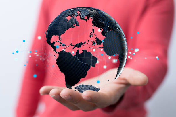 istock Person presenting the virtual projection of the world map with satellite data connections 1478399197