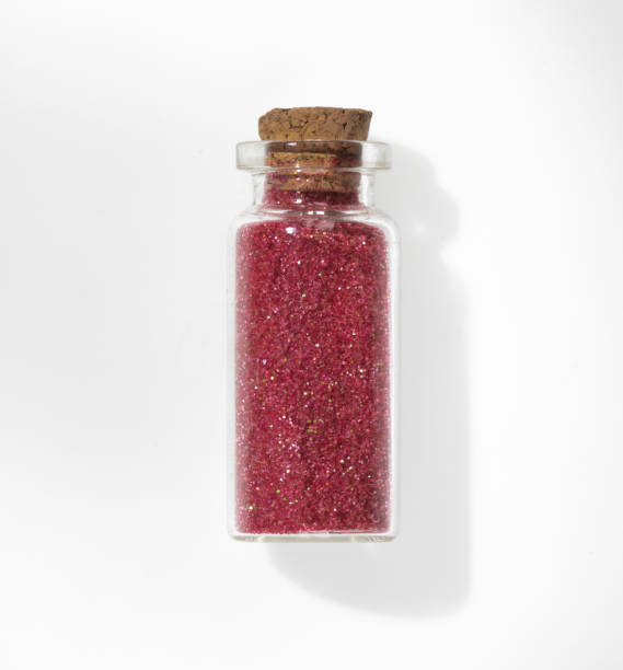 istock glitter bottle isolated on white background 1478400195