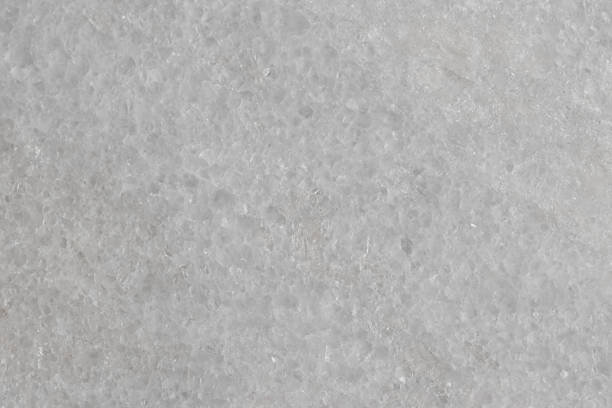 istock Natural stone tile in light gray color with scratches and marble effect. 1478406617