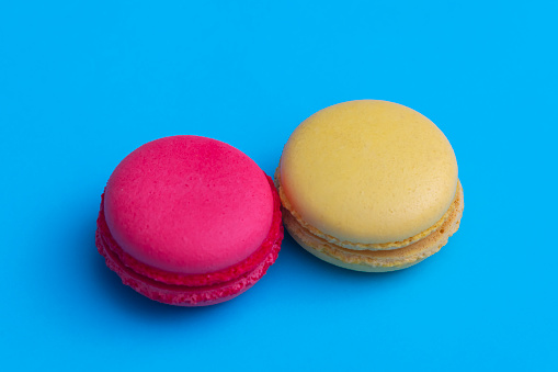 Red and Yellow Macaroon on blue background