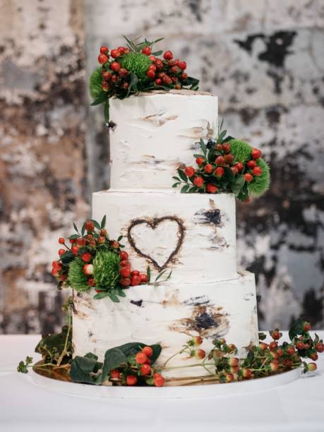 istock Gorgeous white cake with a unique and romantic heart-shaped centerpiece 1478410547