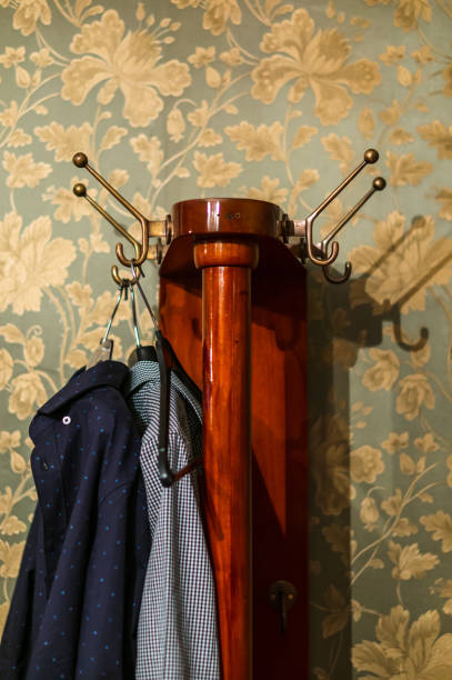 istock Vertical shot of clothes hanging on a wall hanger 1478413382