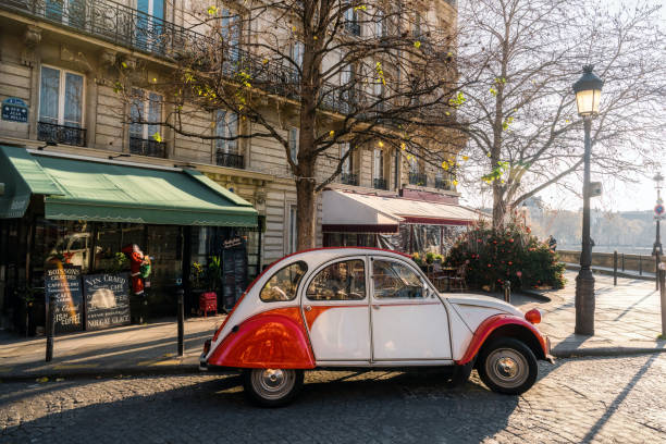 french vintage car on street in paris stock photo