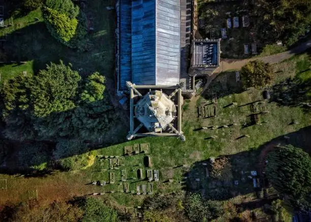 An aerial view of a water tank in a rural area