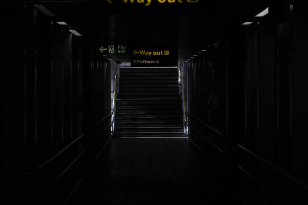 istock Nice shot of a dark walkway with ssome signs 1478424285