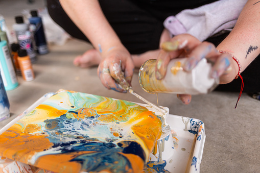 Woman Making Art - Acrylic Pour Abstract Art - Orange, Teal, Blue, Green, White