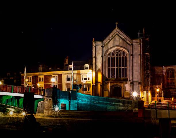 istock Holy Trinity Weymouth with St Nicholas church at night 1478427374