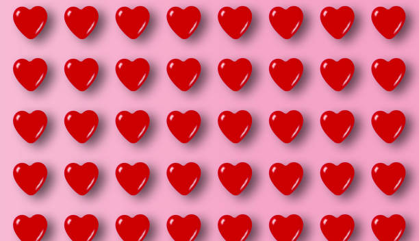 istock 3D rendering of red hearts on a pink background with copyspace - Valentine's day theme 1478428327