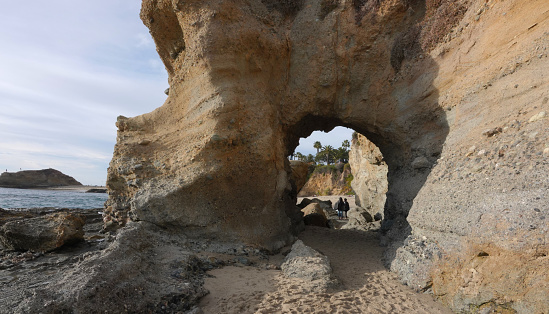 The natural arch at Treasure Island Beach in Laguna Beach, California