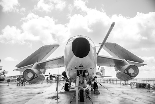 Charleston, United States – October 22, 2022: A grayscale shot of a jet on the USS Yorktown at Patriots Point
