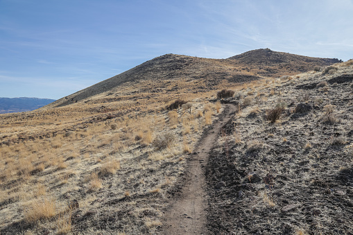 A dirt single track trail makes the rugged foothills accessible to hikers, trail runners and mountain bike riders.