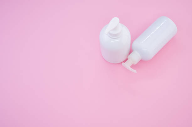 istock High angle shot of white plastic bottles on a pink background 1478433225