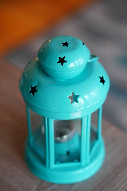 A top view of a blue lantern on a blurred background