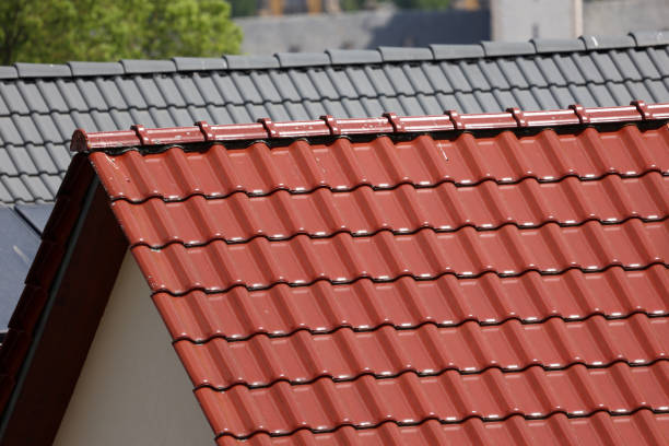 istock Typical tiled roof and chimney against blue sky 1478436057