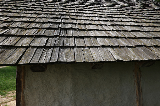 Traditional wooden roof tile of old house.