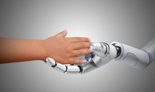 istock Robot and human, hands touch and connect. Smart AI, Machine learning, Chatbot, and Artificial Intelligence lives with human, coexistence concept. 1478437402