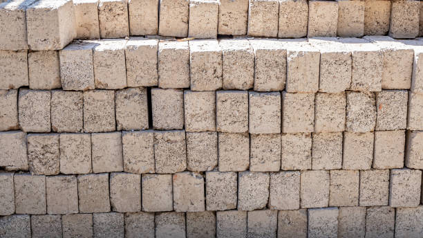 istock Group of stacked grayish bricks forming a wall 1478437549
