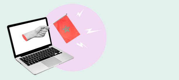 istock Art collage a hand with a Moroccan flag from a laptop on a light background. 1478438039