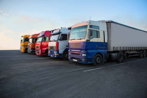 istock Trucks in a row in the parking lot 1478443906