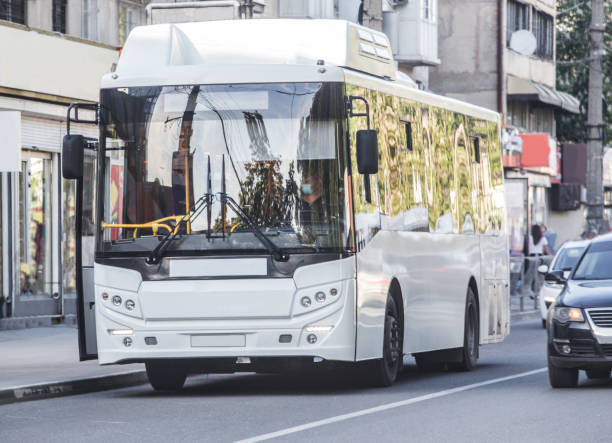 istock City bus at a stop on street 1478446209