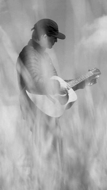 A Man Plays the Guitar; Black and White
