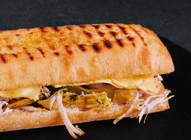 istock Big sandwich with chicken on stone board 1478459651