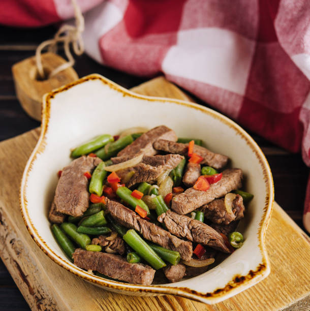 Veal with green beans and chilli pepper