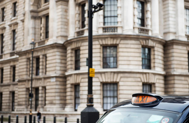 Taxi at Whitehall Place, London - England.