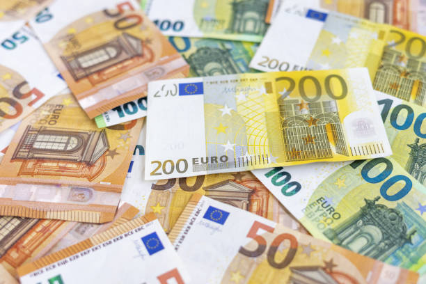 istock Selective focus shot of several euro banknotes for the background and texture 1478476491