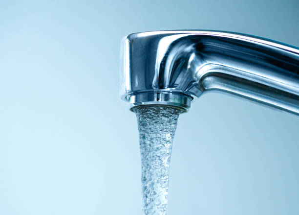 istock Water flows from the faucet 1478477242