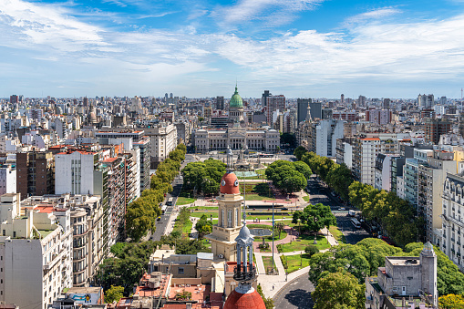 Experience the grandeur and history of Buenos Aires architecture, captured in this photo featuring the Congress Building. The iconic building is the centerpiece of the city's political power and a symbol of democracy in Argentina. This image is a must-have for anyone interested in architecture, history, or politics, and is perfect for travel or educational materials.