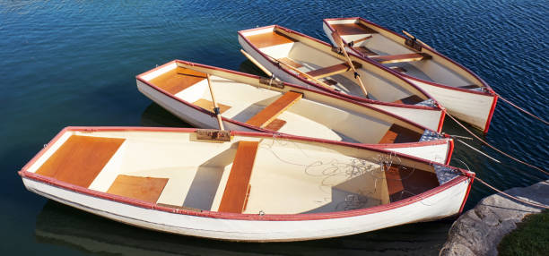 istock Empty boats on the shore of pond 1478479614