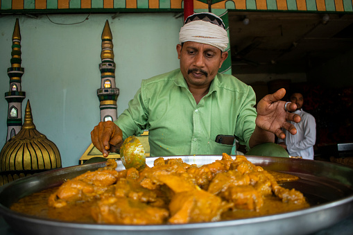 Guwahati, India. 31 March 2023. Indian Muslim vendor selling food during the holy month of Ramadan  in Guwahati, India on March 31, 2023.
