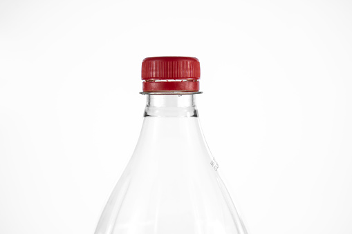 empty plastic bottle with red cap