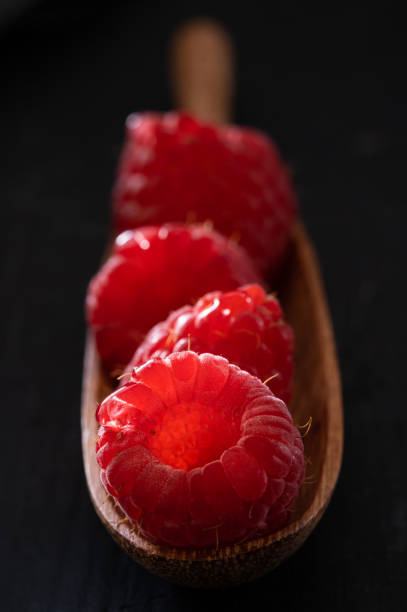 Raspberries on Black stock photo