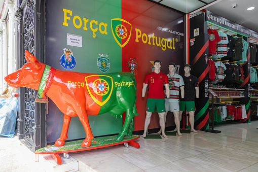 Europe, Portugal, Porto. April 7, 2022. Model cow painted in the Portugese national team colors.