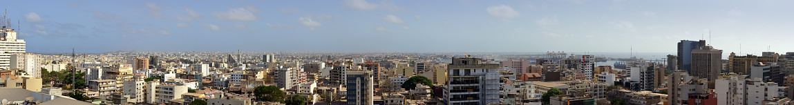 Dakar (Plateau), Senegal: wide panorama of the center of the Senegalese capital with the harbor on the right and the Mamelles hills on the left - The French occupation in this area was first concentrated on the island of Gorée. In 1857 Governor Pinet-Laprade planned a city on the tip of the Cape-Verde peninsula, with a large port and a train station linking it to Saint-Louis (capital of French West Africa until 1902). It was the capital of the Federation of Mali between 1959 and 1960, later becoming the capital of Senegal.