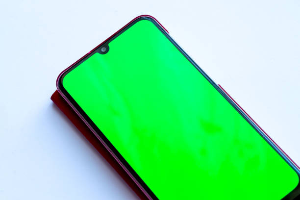 istock touchscreen phone with a green screen on a white background 1478501953
