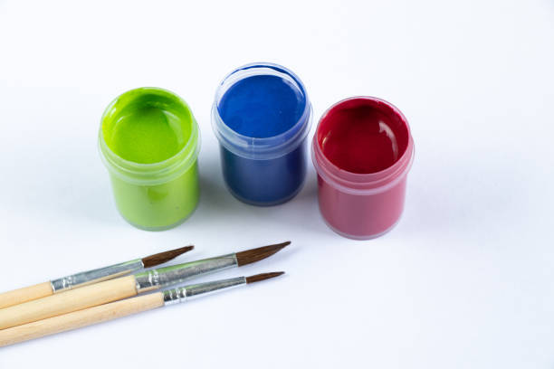 istock watercolor paints stand on a table in daylight 1478502680