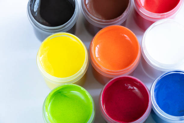 istock watercolor paints stand on a table in daylight 1478503213